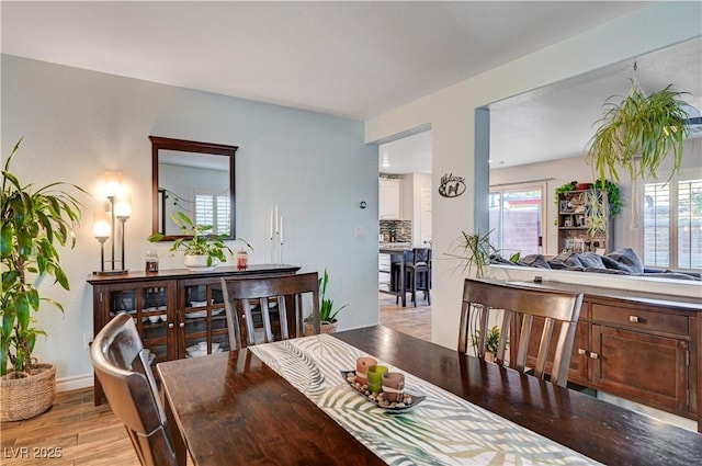 dining room with light hardwood / wood-style floors