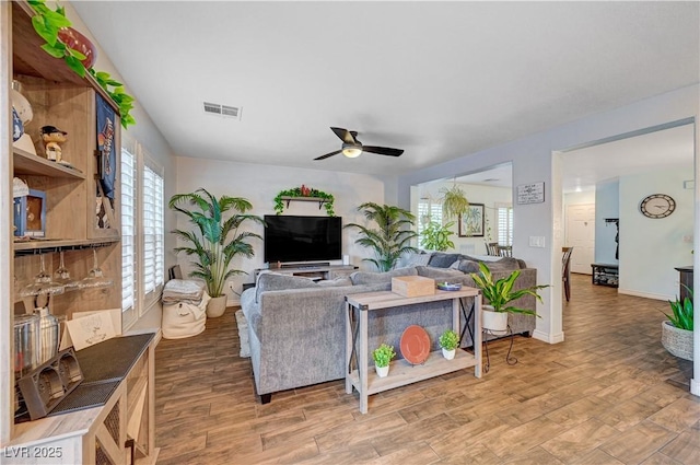 living room with ceiling fan