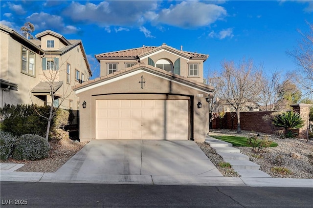 view of front of property with a garage