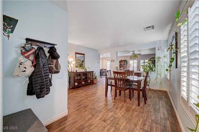 dining area featuring light wood-type flooring