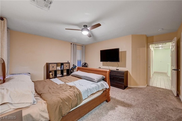 bedroom with light carpet and ceiling fan