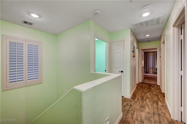 hallway featuring hardwood / wood-style floors