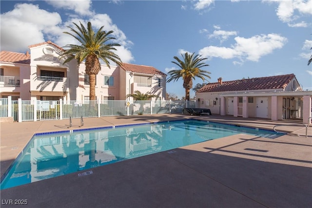 view of swimming pool with a patio