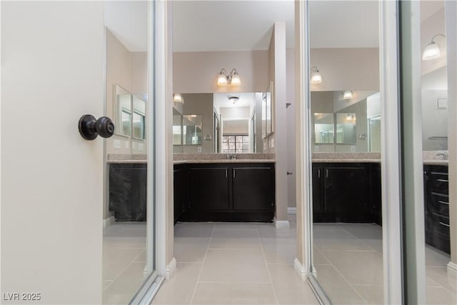 bathroom featuring vanity and tile patterned floors