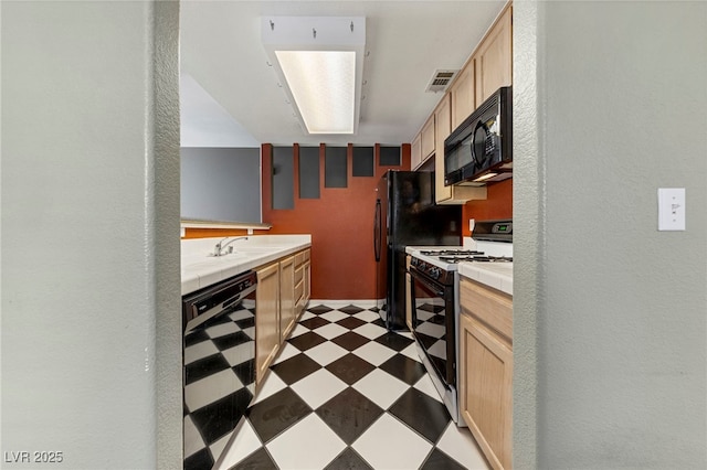 kitchen with white range with gas cooktop, light brown cabinets, wine cooler, and sink