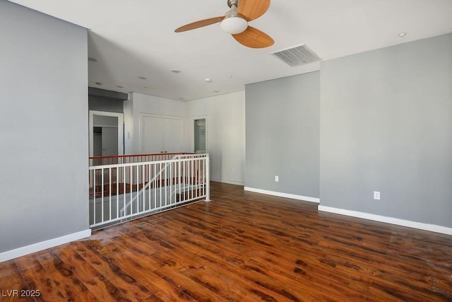 unfurnished room featuring ceiling fan and wood-type flooring