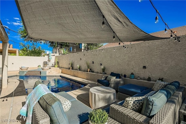 view of patio featuring a jacuzzi