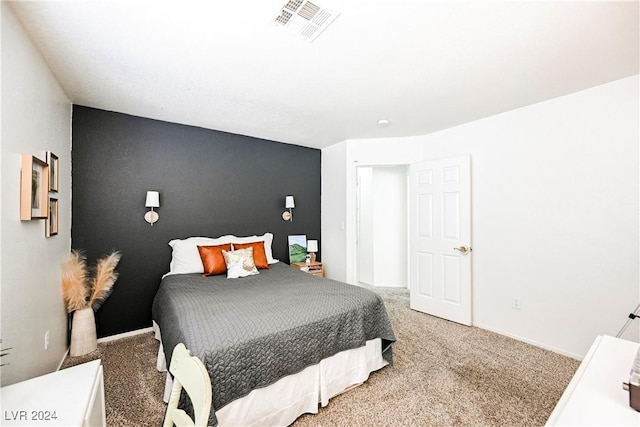 bedroom featuring carpet