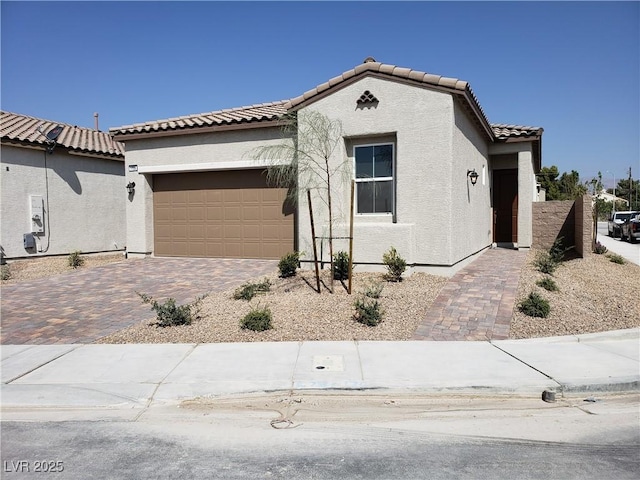 view of front of home with a garage