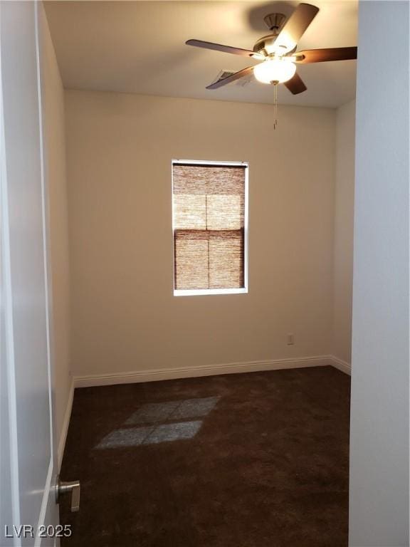 spare room with ceiling fan