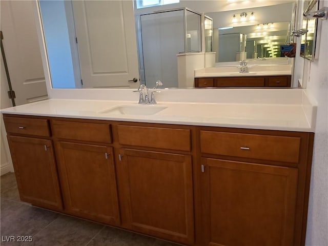 bathroom with tile patterned floors and vanity