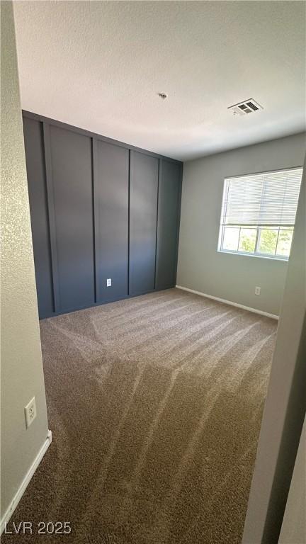 3025 Sunrise Bay Ave, North Las Vegas, NV 89031 - spare room with carpet floors and baseboards