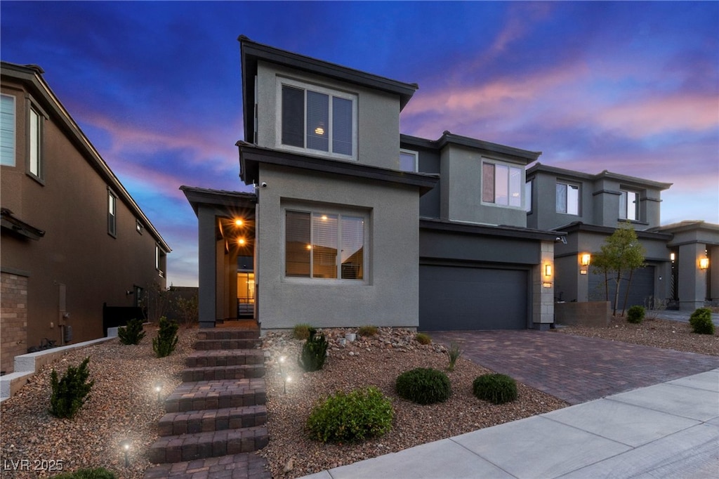 view of front of property with a garage