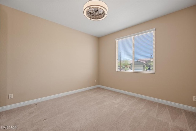 unfurnished room with light colored carpet