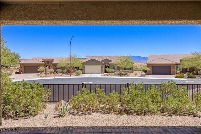 exterior space featuring a mountain view and a garage