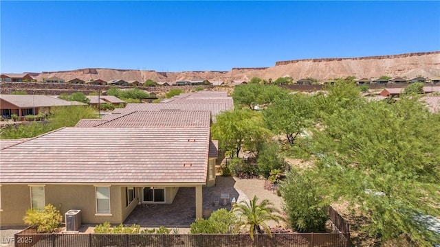 birds eye view of property featuring a mountain view