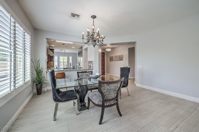 dining room with a chandelier