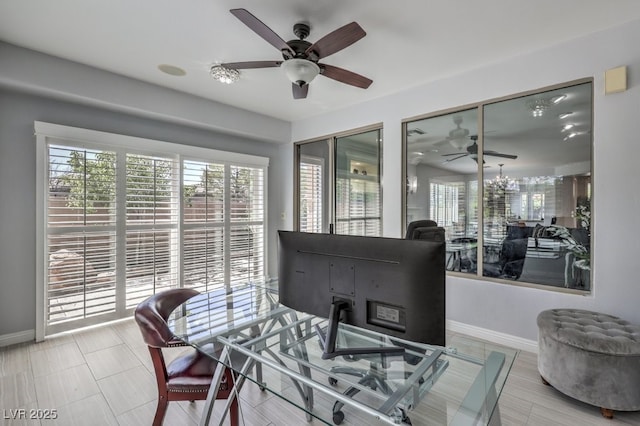 dining space with ceiling fan