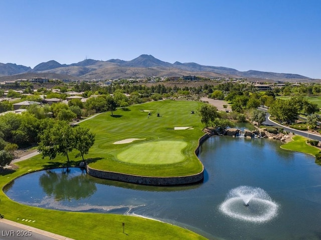 surrounding community featuring a water and mountain view