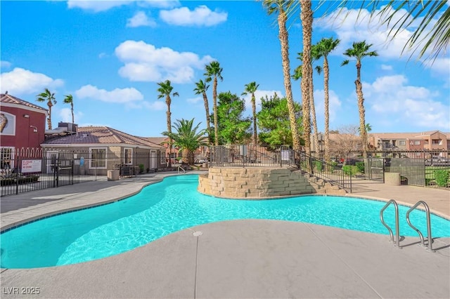 view of swimming pool featuring a patio area