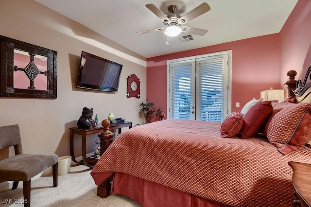 carpeted bedroom featuring access to exterior and ceiling fan