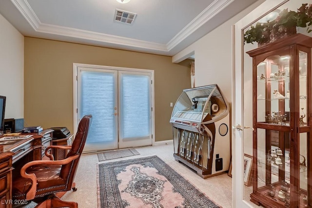 carpeted office space featuring ornamental molding and french doors