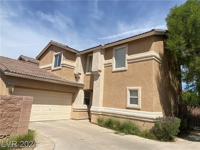 view of front of home featuring a garage