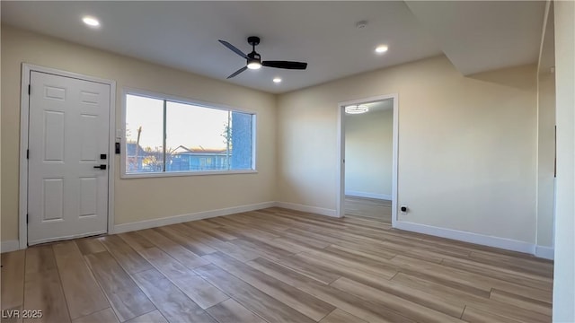 interior space featuring light wood-type flooring and ceiling fan