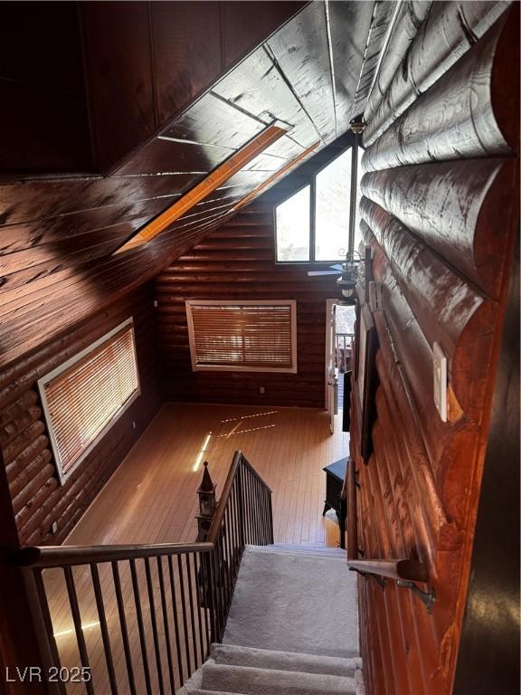 bonus room with vaulted ceiling