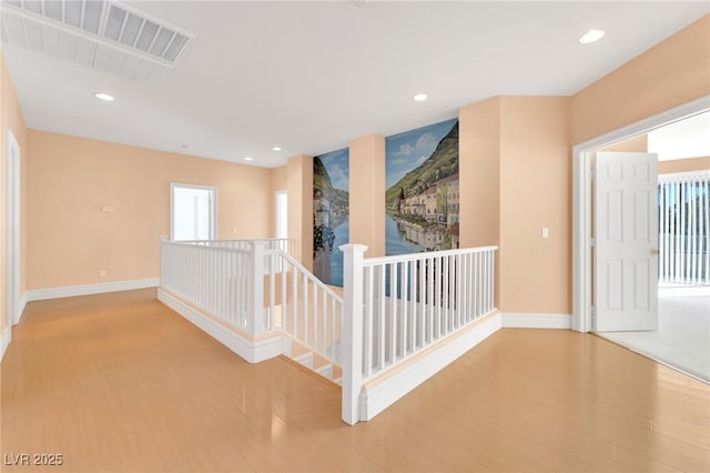 hallway featuring light wood-type flooring