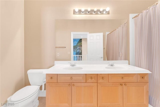 bathroom with toilet, vanity, tile patterned floors, and curtained shower