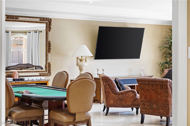 sitting room featuring ornamental molding