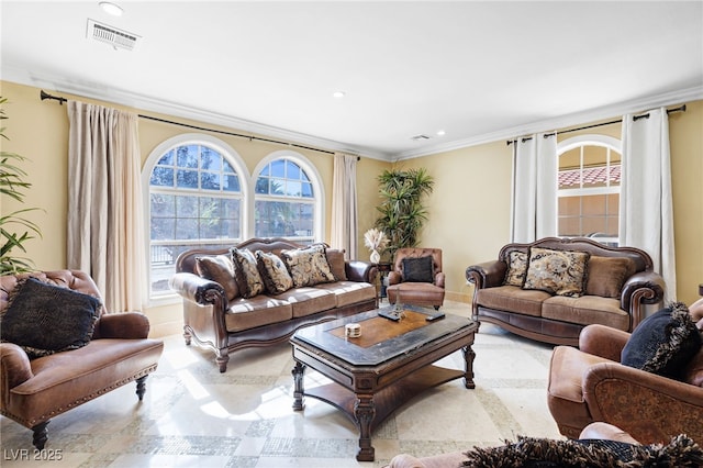 living room featuring crown molding