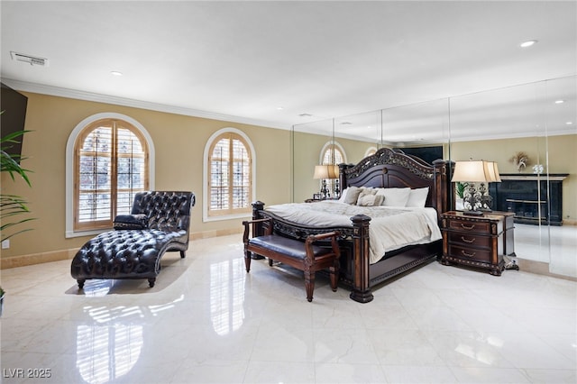 bedroom with ornamental molding