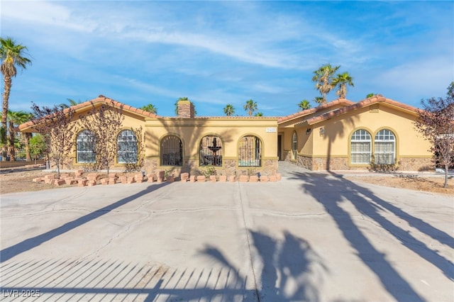 view of mediterranean / spanish-style house