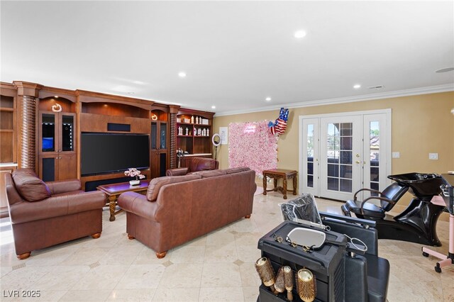 living room featuring crown molding