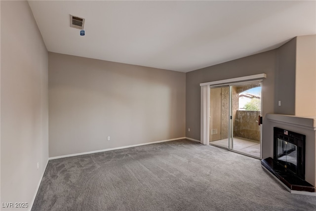 unfurnished living room with carpet floors