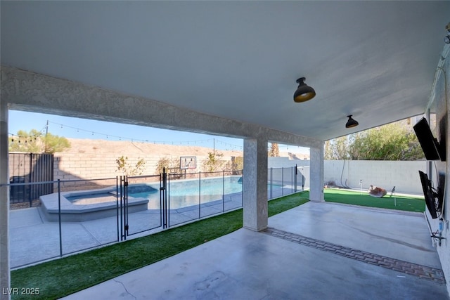 view of patio with an in ground hot tub and basketball hoop