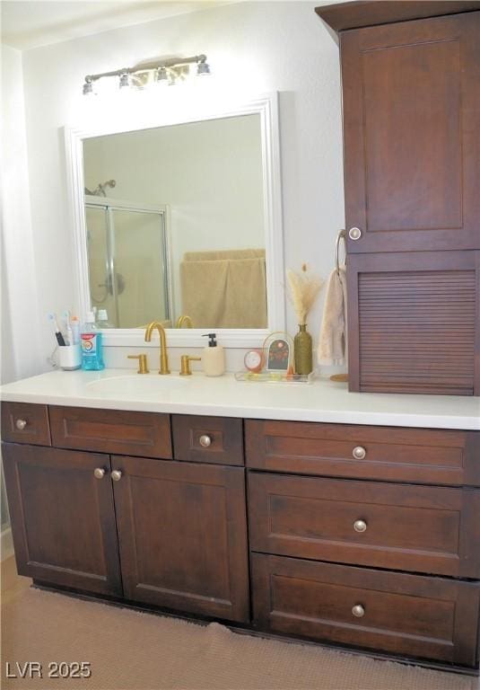 bathroom featuring vanity and walk in shower