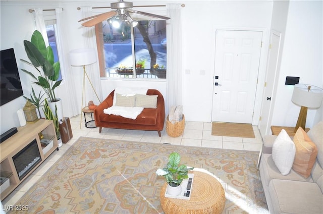 interior space featuring ceiling fan and a healthy amount of sunlight