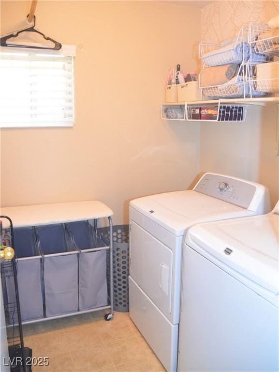 laundry room with independent washer and dryer