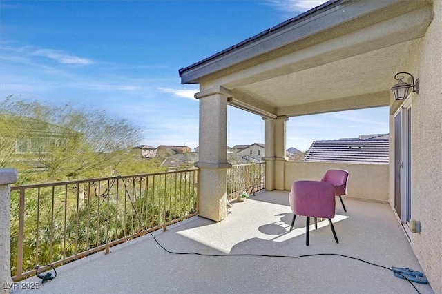 view of patio / terrace with a balcony