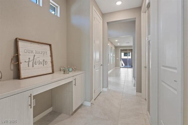 hallway with light tile patterned flooring