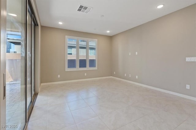 view of tiled spare room