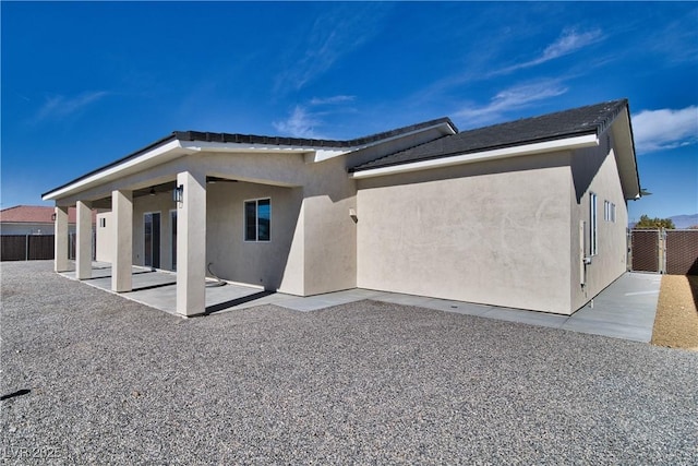 rear view of house with a patio area