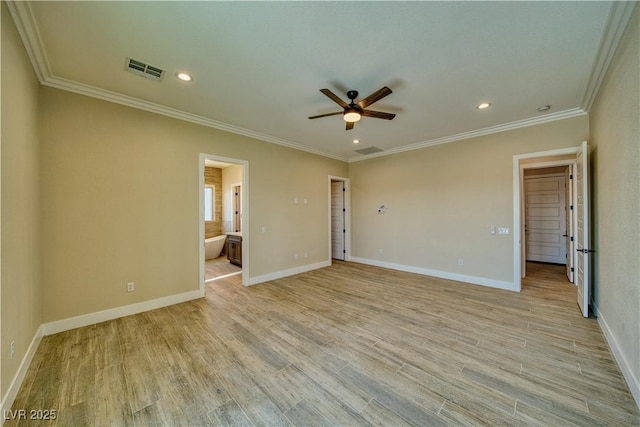 unfurnished room featuring light hardwood / wood-style flooring, ornamental molding, and ceiling fan