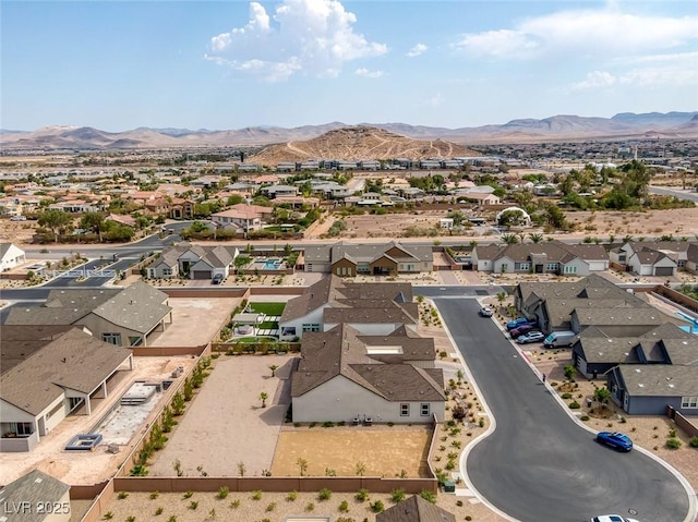 drone / aerial view featuring a mountain view