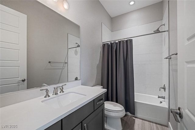 full bathroom with hardwood / wood-style floors, shower / bath combination with curtain, toilet, and vanity