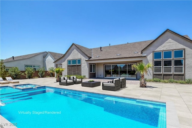 rear view of property with outdoor lounge area, an in ground hot tub, and a patio