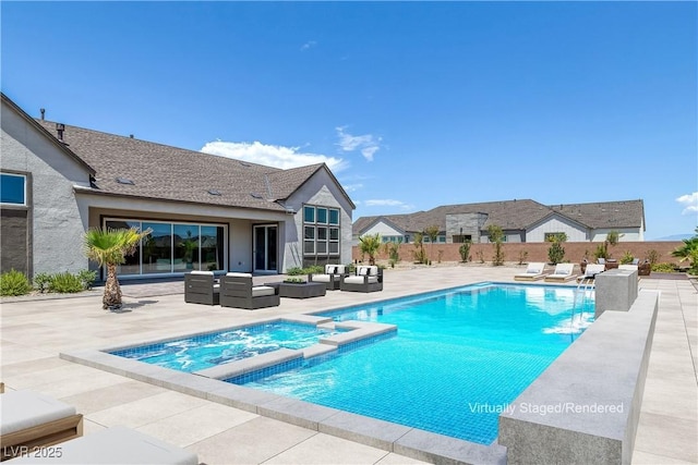 view of pool with an in ground hot tub, outdoor lounge area, and a patio